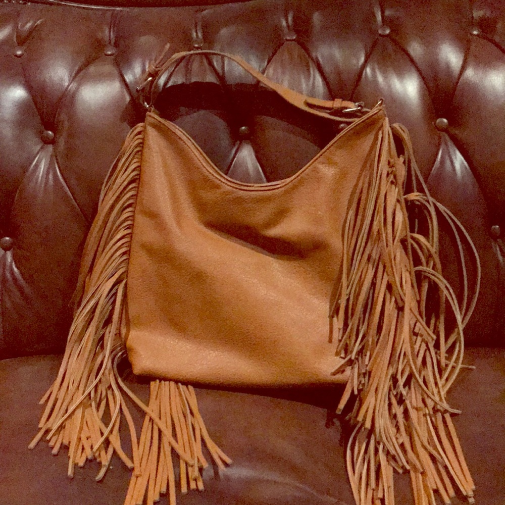 Woman’s leather tan purse